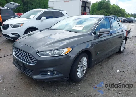 2015 Ford Fusion Energi Se Luxury z USA, uszkodzony, nr VIN 3FA6P0PU1FR255530